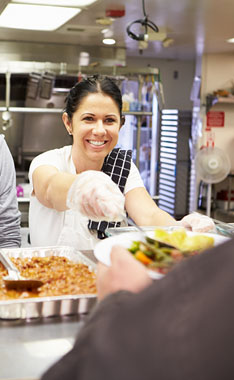 volunteer serving food