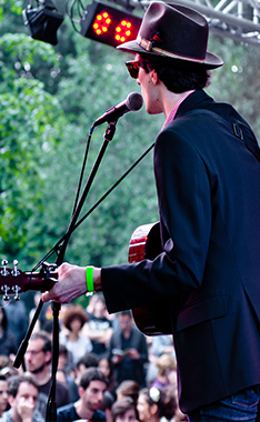 musician playing at a festival