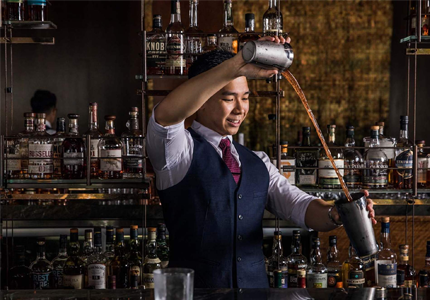 bartender mixing a drink